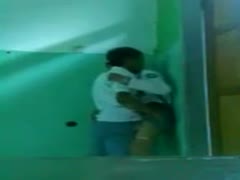 Without realizing the concealed camera filming, a man masturbates in front of his wife.